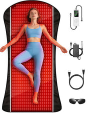 ROMISA full-body red light therapy mat laid on a sofa for home wellness sessions.