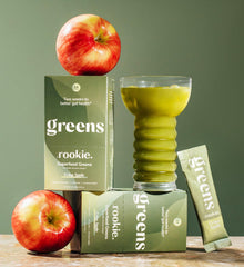 Rookie Wellness green drink in glass supports digestion and sustained energy.