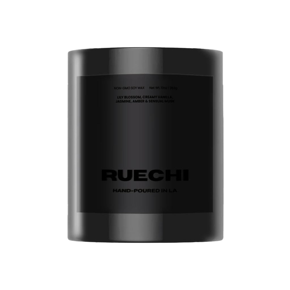 Ruechi Beauty luxury soy candle close-up with lily and jasmine for serene ambiance
