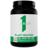 Rule 1 Plant Protein vanilla powder being scooped for a quick vegan shake.