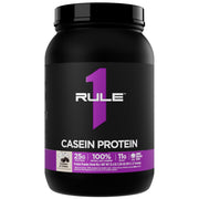 Rule 1 Casein Protein bottle, side view, highlighting 25g protein per serving.