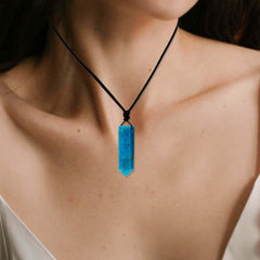 Runyangshi Blue Apatite pendant closeup reveals natural inclusions and shimmer for ambience.