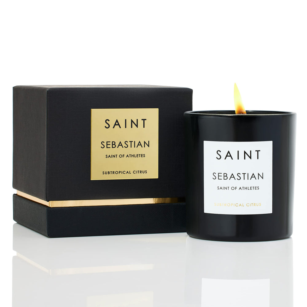 SAINT Sebastian candle label with prayer coin enhances sacred ambiance in the living room.