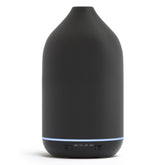 SALKING ceramic diffuser with black textured finish enhances ambiance and scent diffusion.