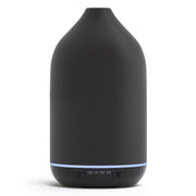 SALKING ceramic diffuser with black textured finish enhances ambiance and scent diffusion.