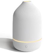 Salubrito essential oil diffuser top view showing compact 100ml capacity for small spaces