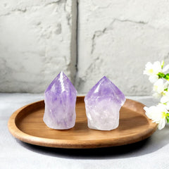 Samsari amethyst point placed in a calming meditation space.
