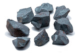 SAMSARI hematite raw stones close-up with metallic luster for grounding energy.