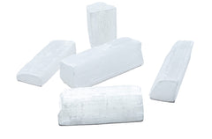SAMSARI selenite stones raw closeup for calm energy and crystal healing inspiration.