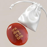SANROA worry stone held in hand for daily stress relief.