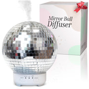 SCANDINORDICA Mirror Ball Diffuser in polished silver enhances living room ambiance.