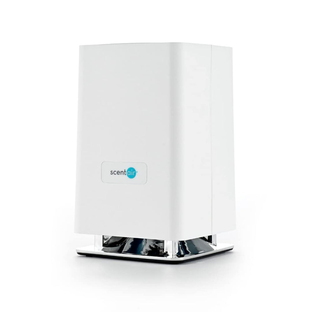ScentAir Whisper Home compact diffuser shown on a shelf for discreet scenting