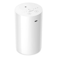 ScentBots Waterless Diffuser with cloud mist dispersing essential oils across a room.