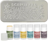Scentered discovery tin front view with six mini balms for daily calm on the go