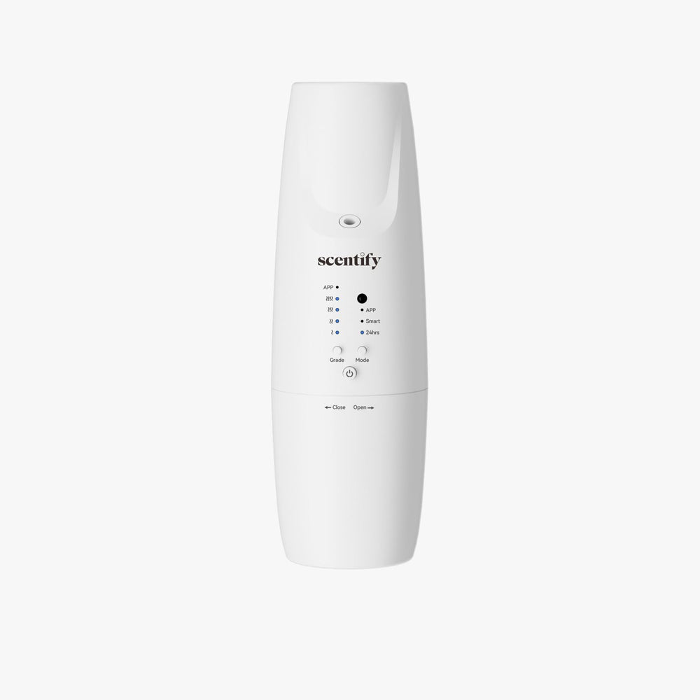 Scentify Plug-in Diffuser V2 at outlet, compact design for small rooms