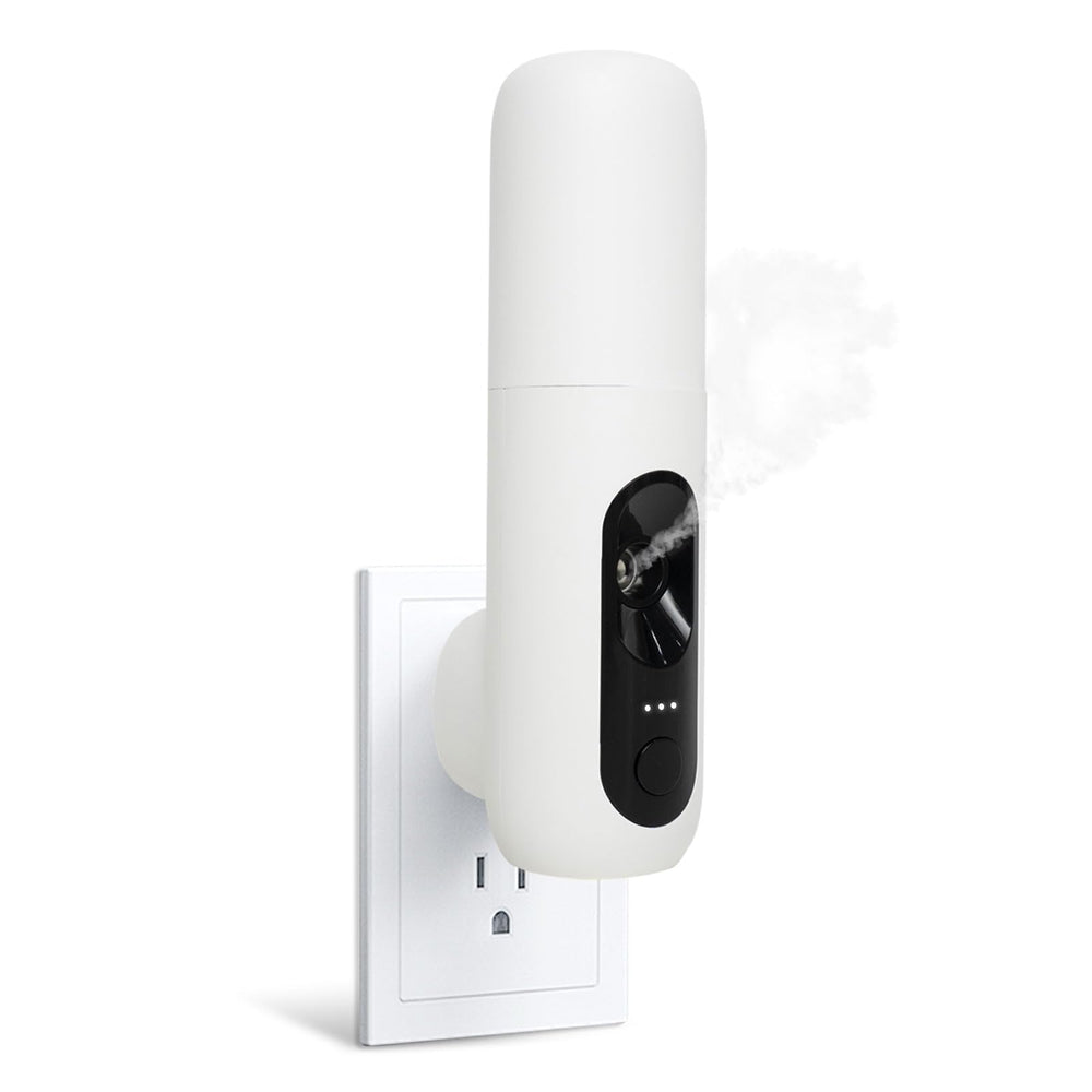 Scentiplus plug-in diffuser front view with compact design for subtle room aroma.