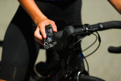 Science in Sport Beta Fuel orange chews on bike for endurance during cycling.