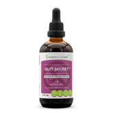 Secrets of the Tribe Quit Secret bottle close-up, alcohol-free tincture for easy daily use.