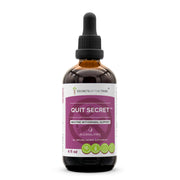 Secrets of the Tribe Quit Secret bottle close-up, alcohol-free tincture for easy daily use.