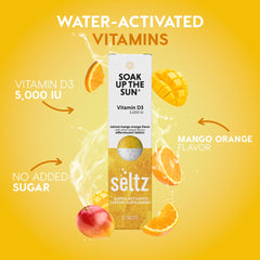 Seltz Soak Up The Sun fizzing in a glass of water with Mango Orange flavor.