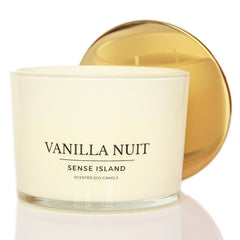 Beige glass vessel of Sense Island Vanilla Nuit complements home style while delivering creamy vanilla notes.