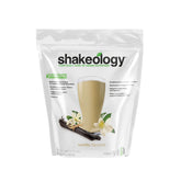 Shakeology Vanilla protein powder container highlighting vegan protein blend for lean muscle support