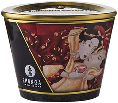 Shunga Massage Candle Sparkling Strawberry Wine candle lit for warm ambiance.