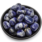 SigMntun sodalite polished stone closeup for chakra focus during meditation