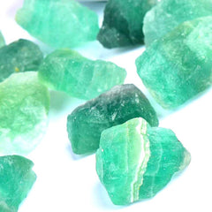 Simurg green fluorite rough close-up showing natural color zoning for lapidary projects.