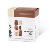 Skratch Labs Energy Bar Cinnamon Oatmeal packaging showcases clean plant-based fueling for workouts.