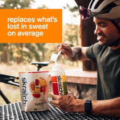 Skratch Labs Hydration Powder athlete drinking after workout with Fruit Punch flavor