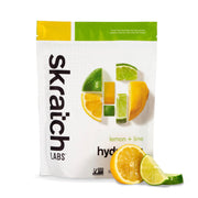 Skratch Labs Hydration Powder lemon-lime tub front shows refreshing electrolyte support during workouts