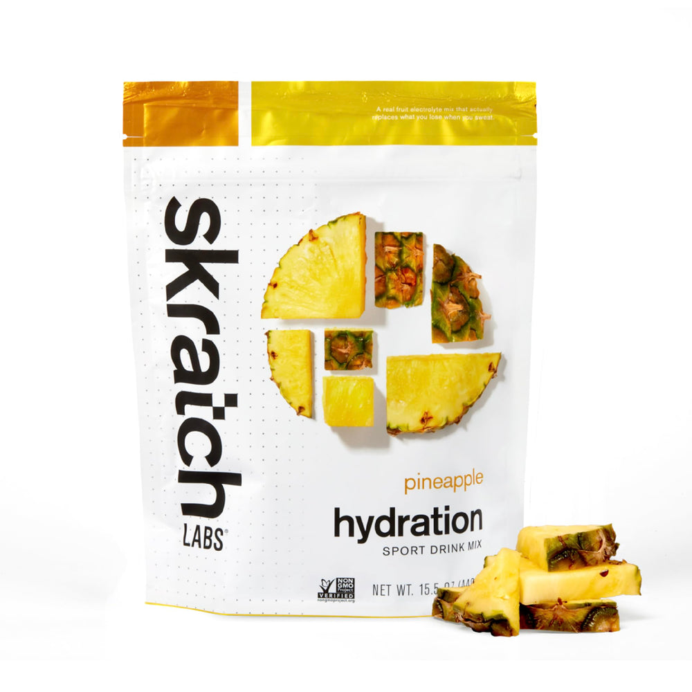 Skratch Labs Hydration Powder pineapple tub ready to mix for sports hydration.