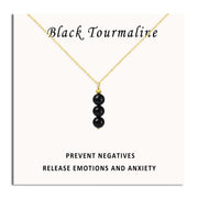 SmileBelle Black Tourmaline Necklace close-up bead shows natural color variation.