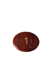 Snakeskin Jasper milestone marker, oval with engraved 1, a tactile keepsake for first-year celebrations.