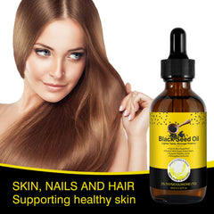 SOLOTREE Black Seed Oil amber bottle highlights premium cold-press formula.