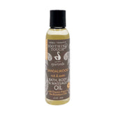 Soothing Touch sandalwood oil bottle ready for daily use to energize body and mind.