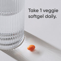 CoQ10 bottle with coconut oil blend highlights absorption support.
