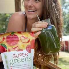 SPRIGS organic greens blend with spoon, highlighting 40+ superfoods
