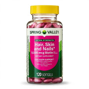 Spring Valley extra-strength biotin softgels bottle shown for beauty support.