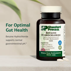 Standard Process Betaine Hydrochloride 180-tablets bottle on shelf for daily digestive support.