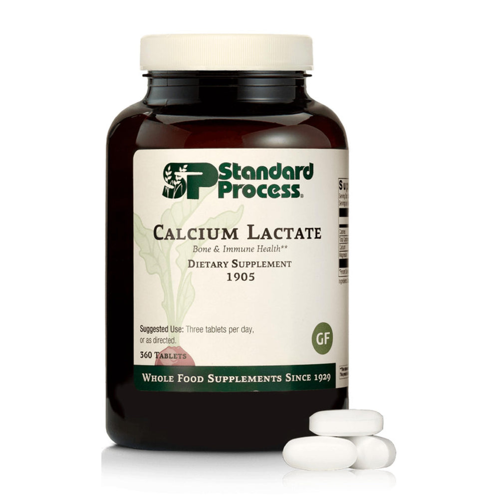 Standard Process Calcium Lactate bottle showing vegan bone support benefits.
