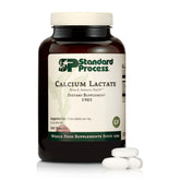 Standard Process Calcium Lactate bottle showing vegan bone support benefits.