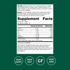 Standard Process Manganese B12 bottle pour shows easy serving and on-the-go convenience.