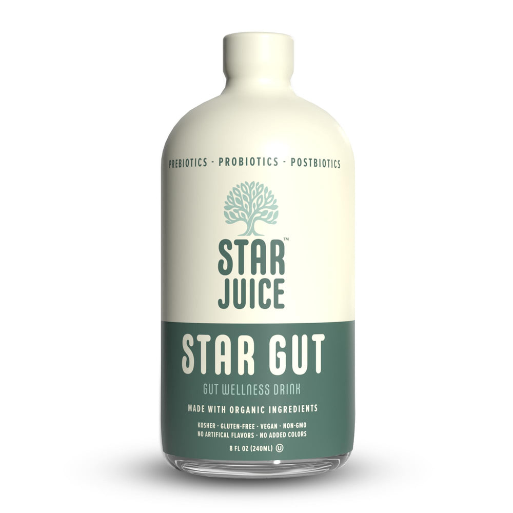 Star Juice bottle on wood table promoting gut health after meals