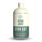 Star Juice bottle on wood table promoting gut health after meals