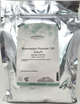 Starwest Botanicals Bromelain powder bottle with label in a kitchen setting.