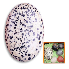 Stino Balmatin oval worry stone held in hand for calming focus