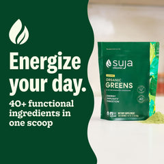Suja Organic Greens Powder scoop in water illustrating easy daily mix.