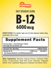 Close-up of Sundance B-12 fast-dissolve tablet dissolving, berry flavor